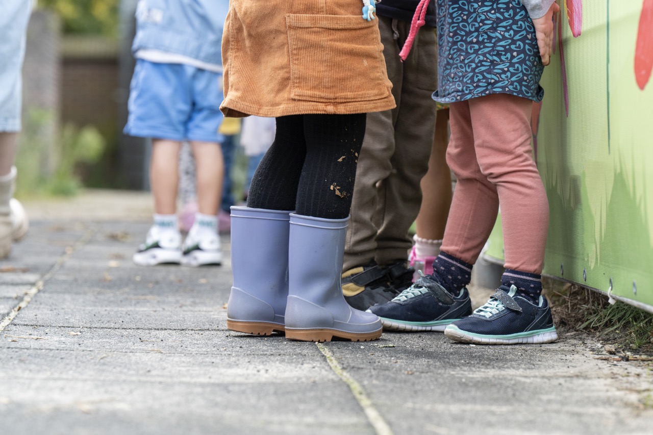 Children enjoying outdoor learning at Open Air Pre School